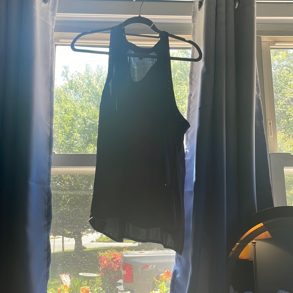 Jennifer Lopez black blouse